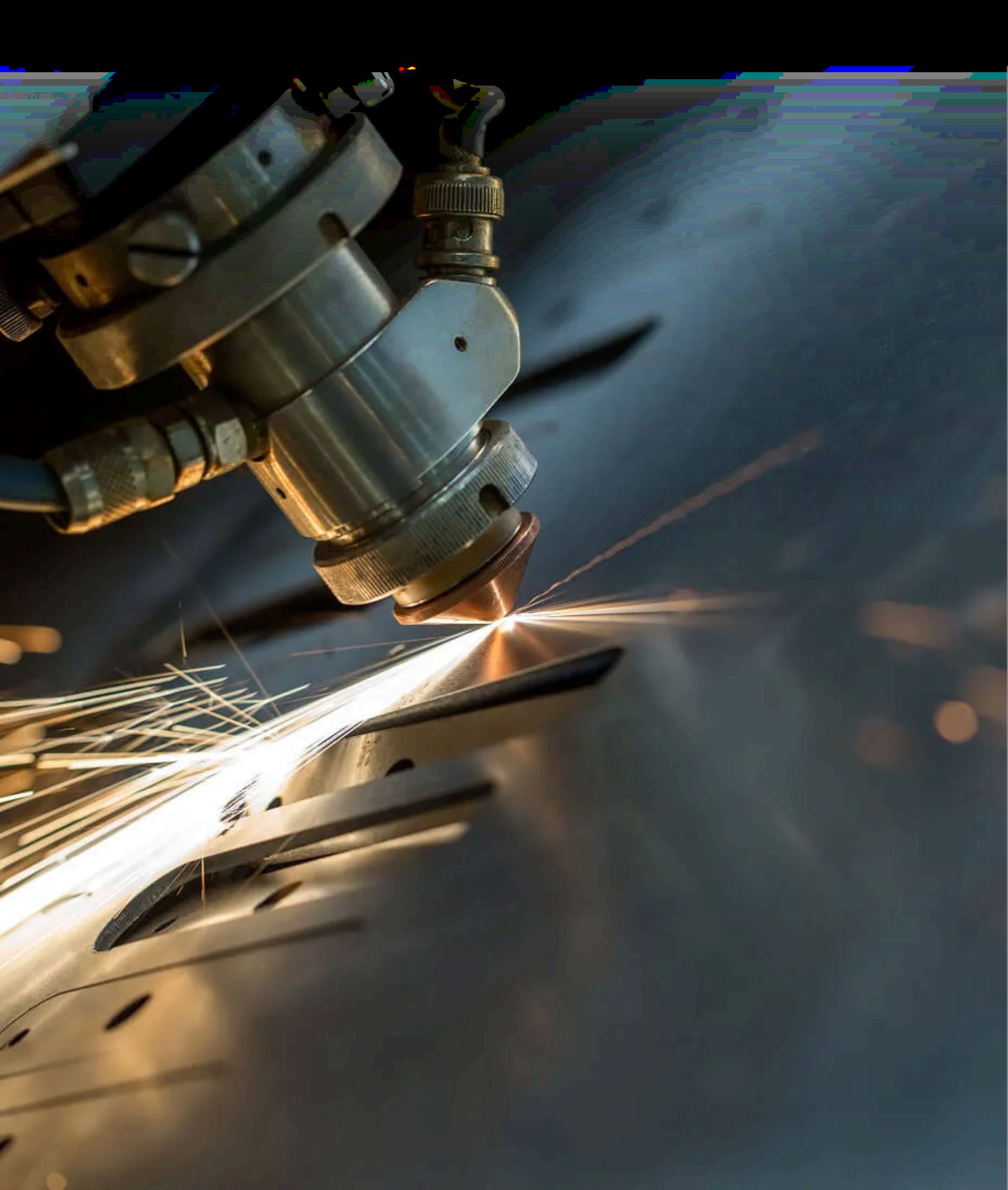 laser cutting machine in action, precisely cutting through a piece of metal.